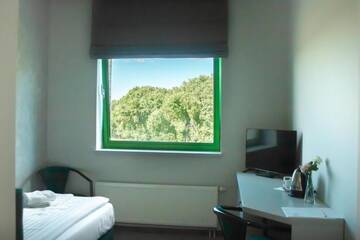 Фото номера Улучшенный одноместный номер Отель Hotel Promenada Biznes &amp; Wypoczynek г. Радом 7
