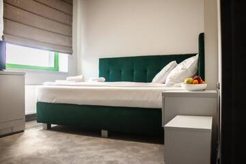 Фото номера Улучшенный двухместный номер с 1 кроватью Отель Hotel Promenada Biznes &amp; Wypoczynek г. Радом 3